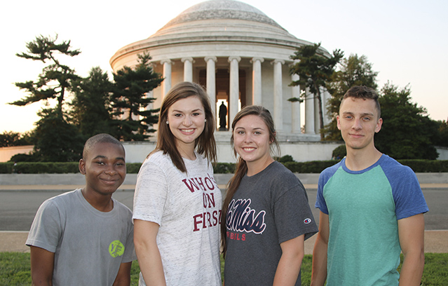 Photo of SRE's four youth leaders touring Washington D.C. monuments in 2017.