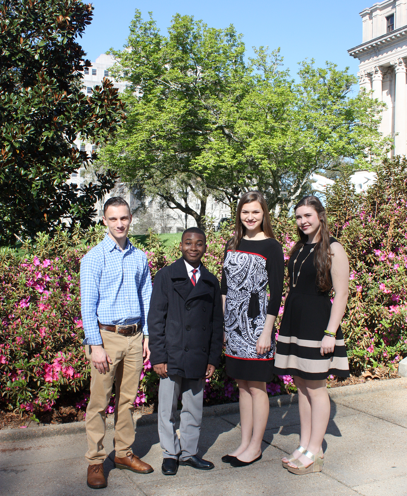 SRE's youth leadership student standing outside at the Mississippi State Capitol