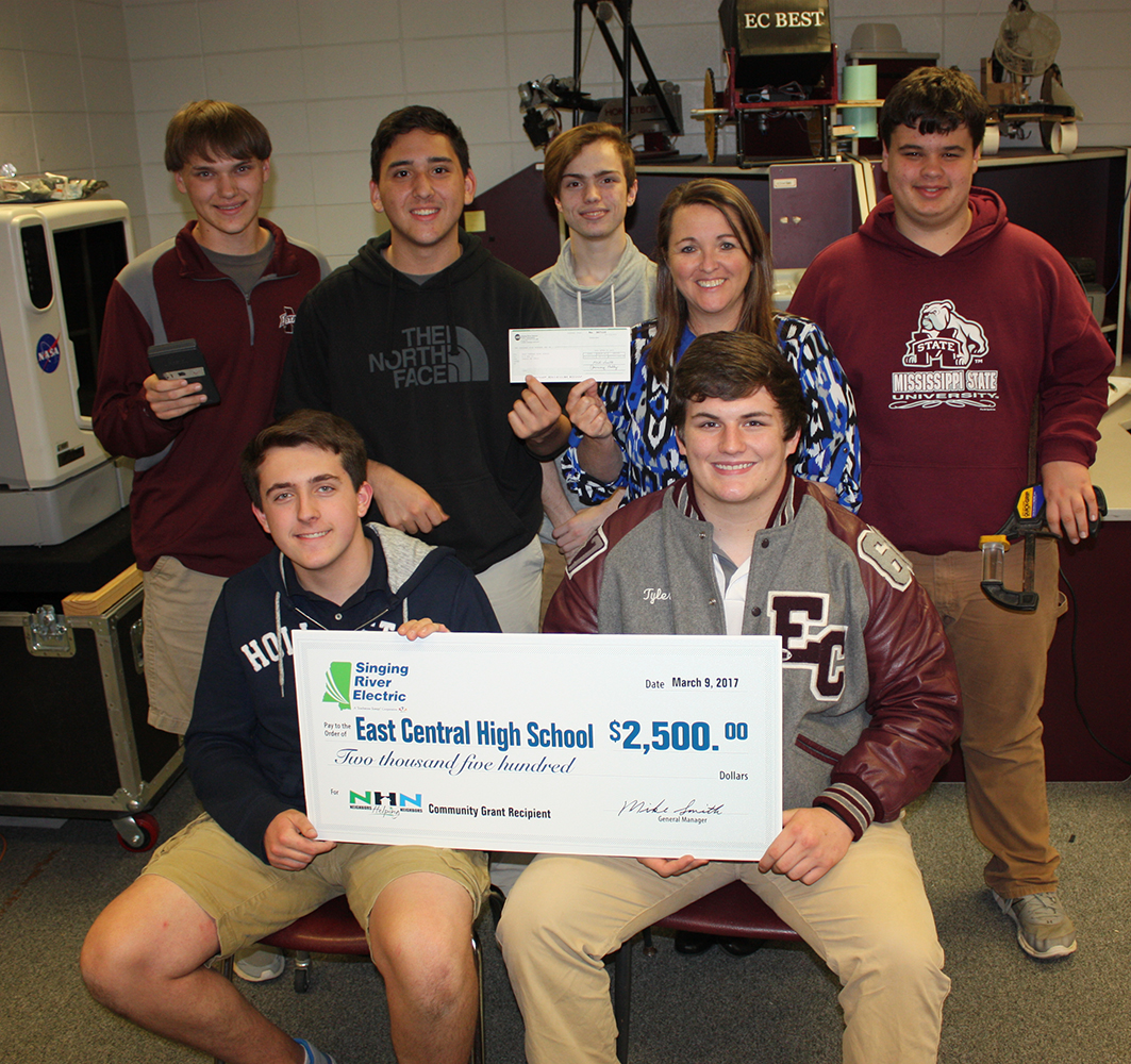 East Central High School students accept a NHN Grant check.