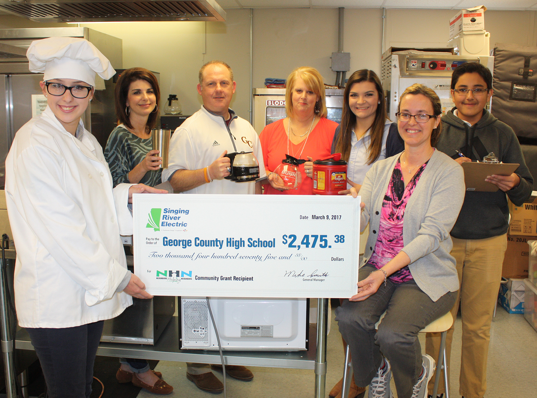 George County High School students, teachers and administrators accept NHN Grant check.