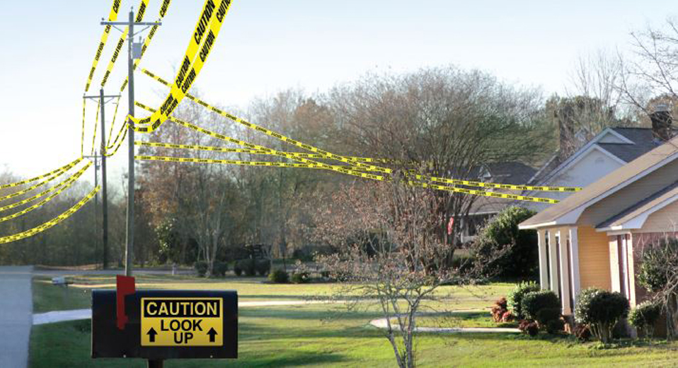 Power lines at a home marked with caution tape