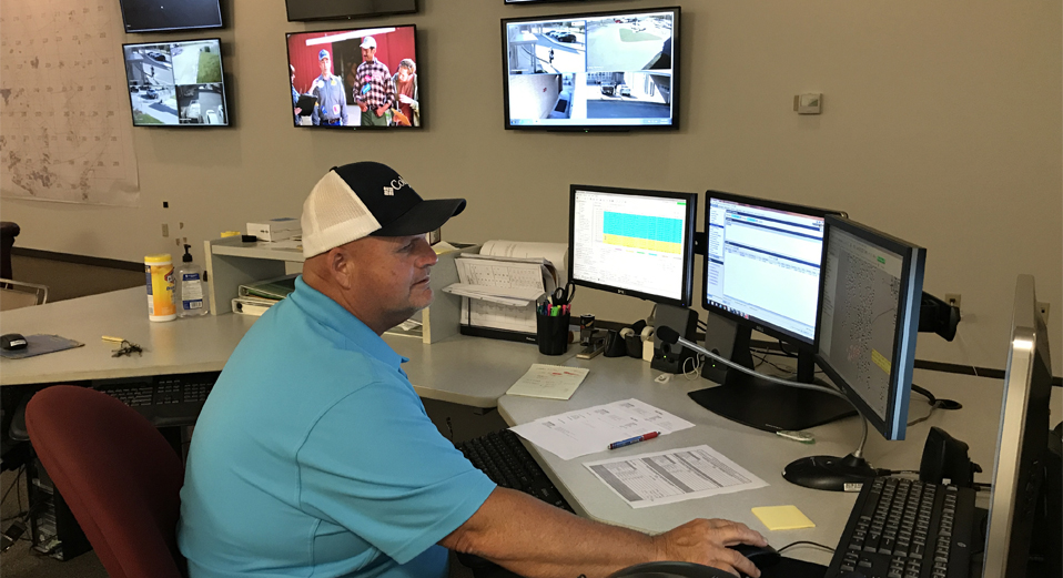 Photo of dispatcher working in Lucedale office.