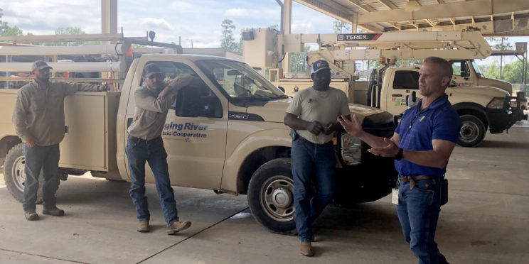 Singing River Electric Manager of Engineering Tom Davis conducts a safety briefing with linemen before they leave to assist East Mississippi Electric Power Association with storm restoration.